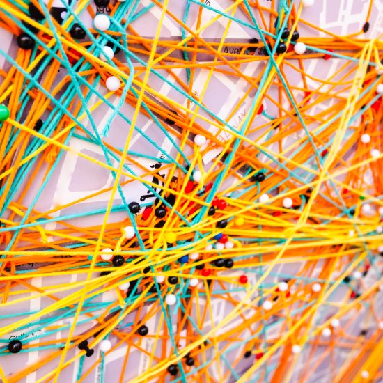 Map of the city of Valencia, joined points with colored threads of wool.